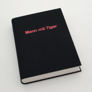 Mann mit Tiger Kompendium